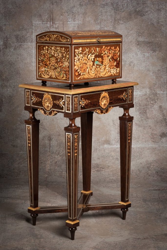 Treasuer Box III with stand. Inlaid with pewter and brass, grotesques and rosettes. 